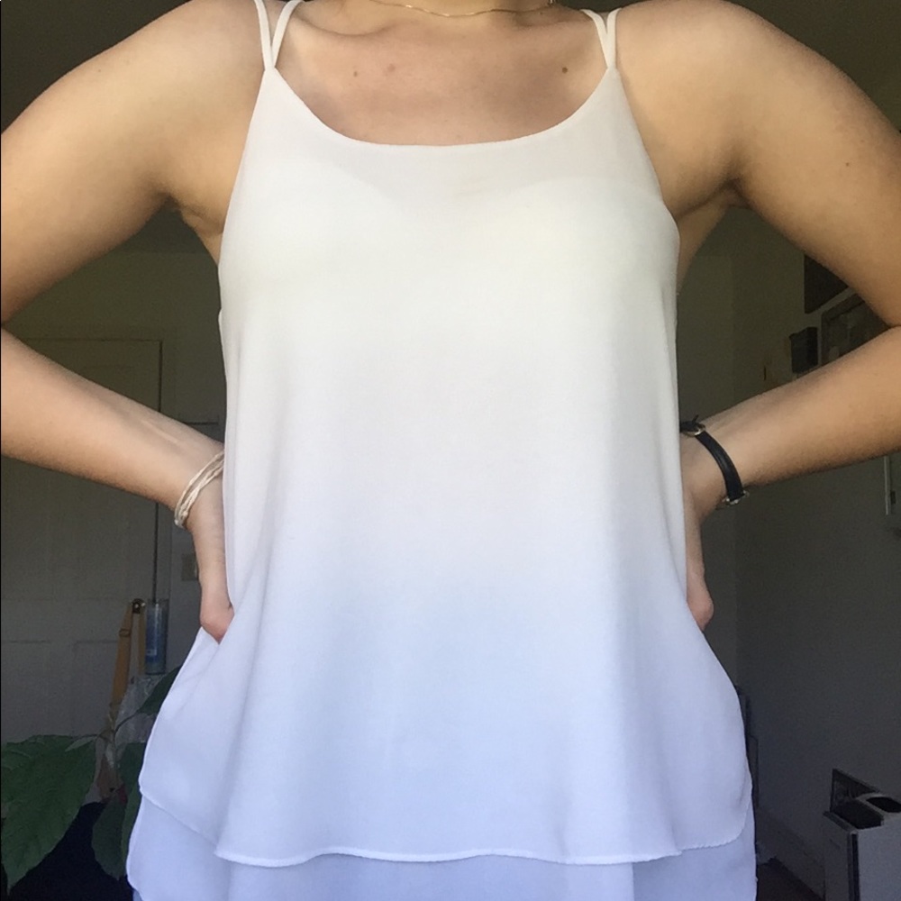 White flowing tank